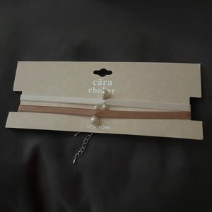 Two packer brown and white chockers